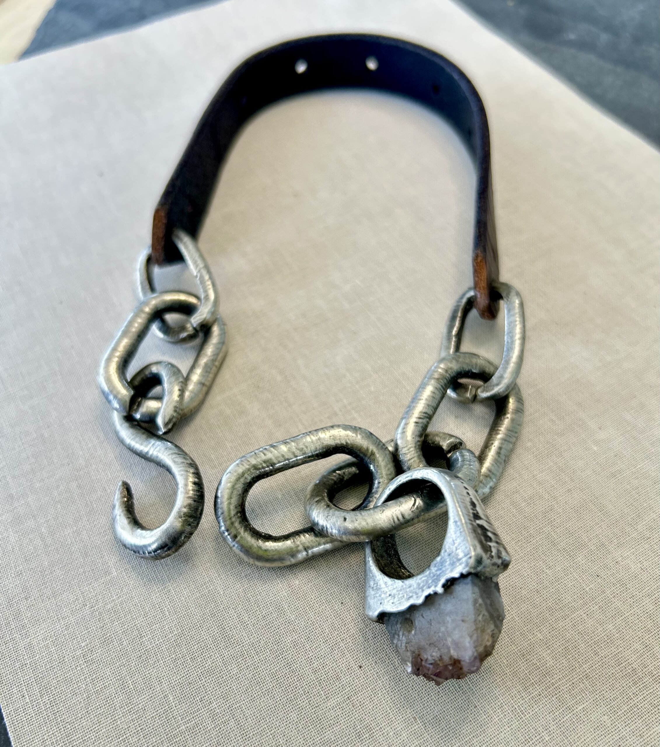 brutalist pewter necklace with raw amethyst pendant and vintage belt detail