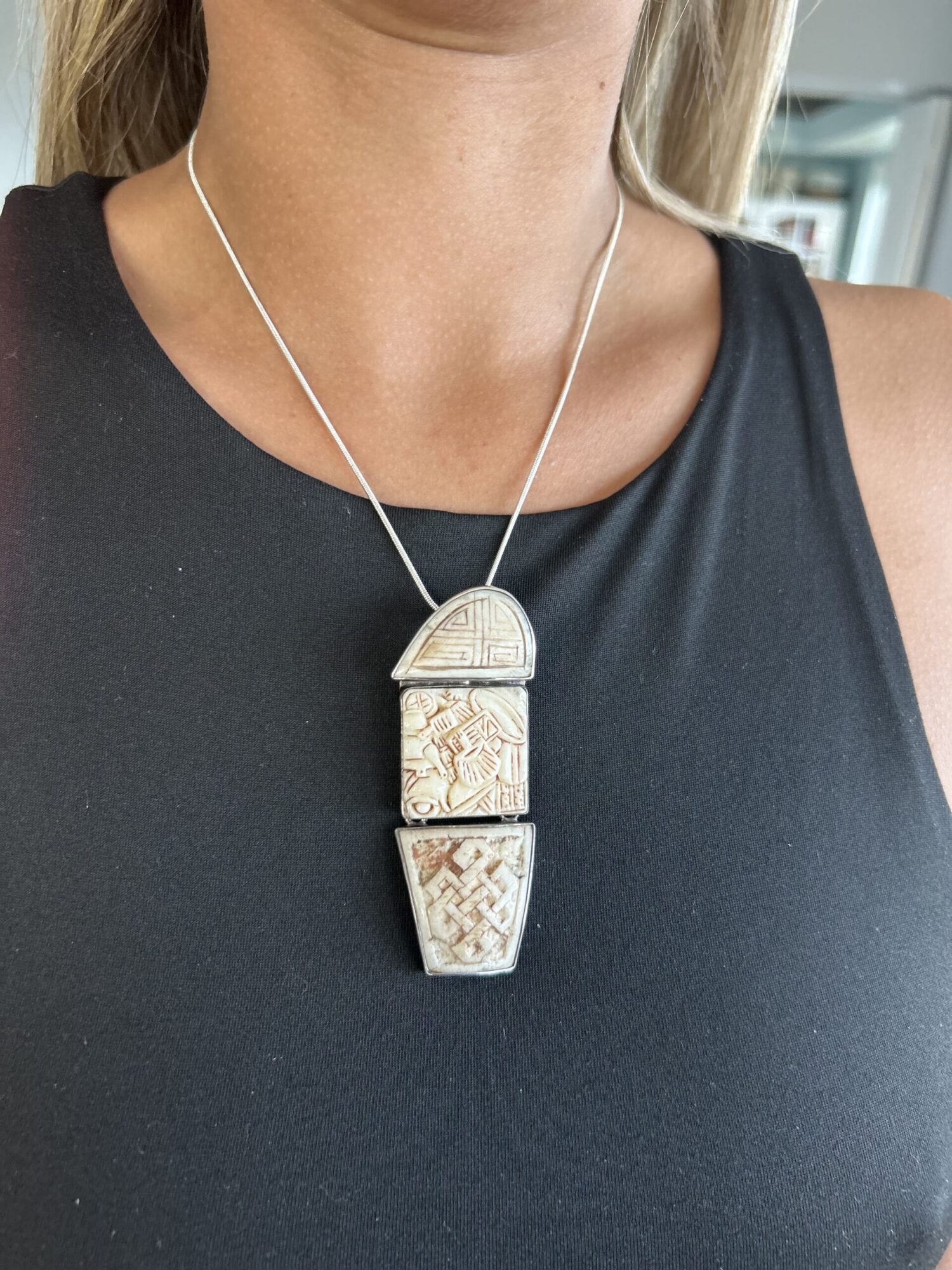 etched bone panels framed in sterling silver statement necklace inspired by Chinese artistry