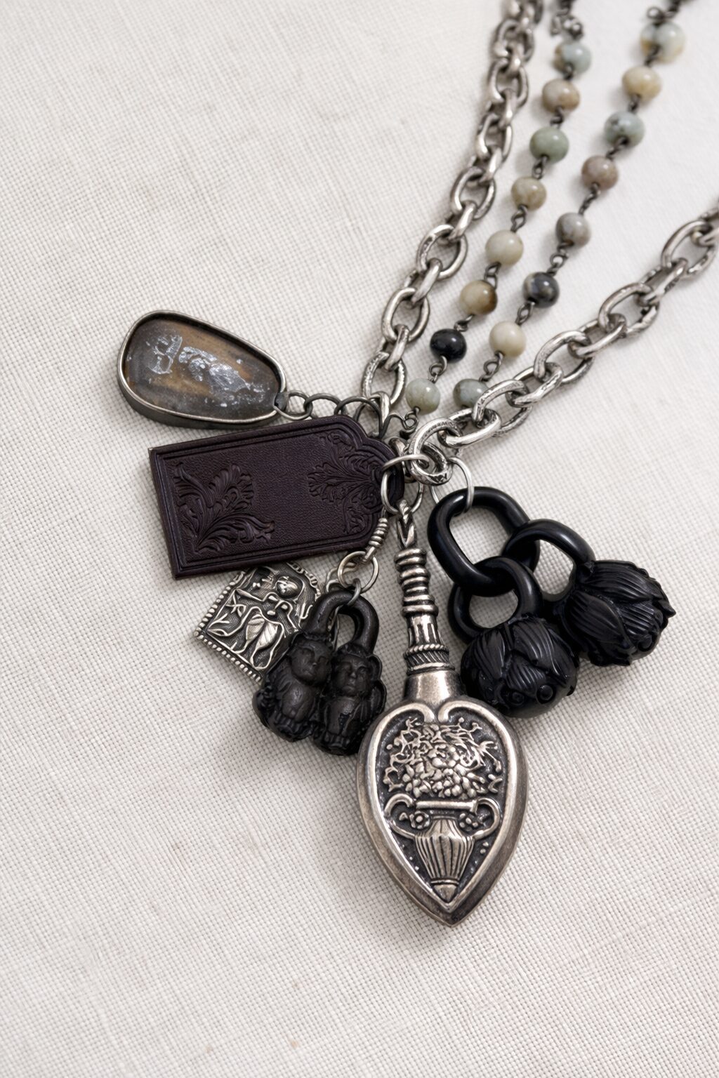 Namaste, Amazonite Buddha Charm Necklace, handcrafted in amazonite, leather and palmwood by Watson Wells Jewelry, third view