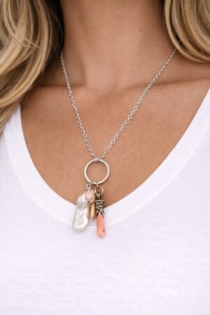 The Crystal handcrafted statement necklace featuring pearl, crystal, and opal, by Watson Wells Jewelry