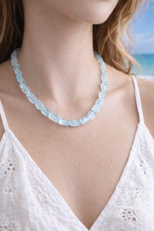 The Blue Lighthouse handcrafted dainty necklace featuring aquamarine and sterling silver, by Watson Wells Jewelry